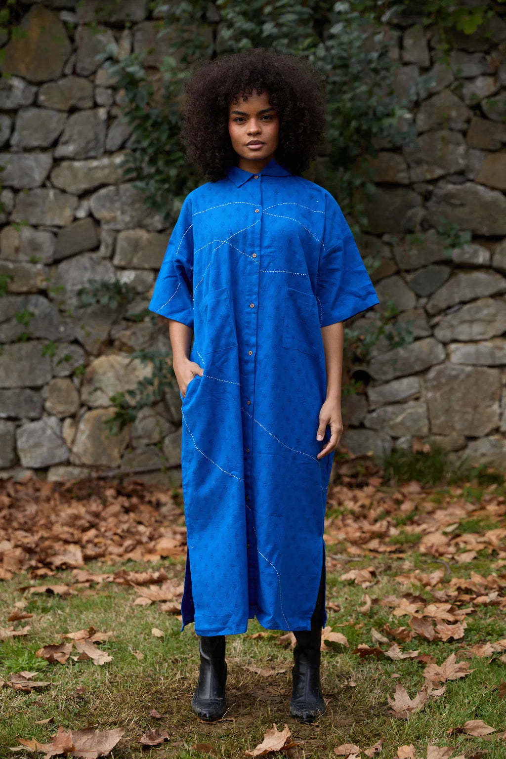 White Canvas Cloud Shine Dress in blue handwoven dobby cotton with Kantha stitching, front view on model