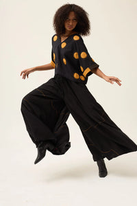 Orange Polka Ringa Pants in handwoven Dobby Cotton by White Canvas - Image 1