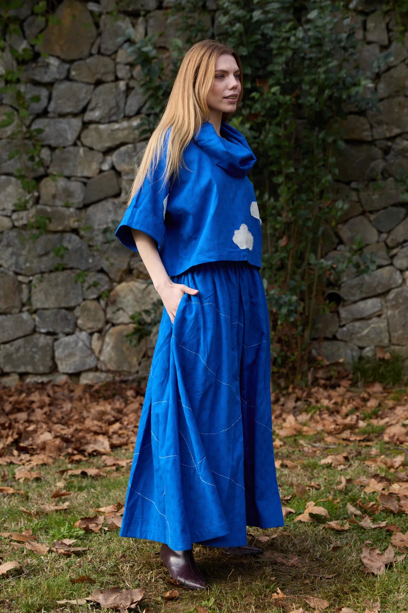 White Canvas Cloud Butter Set in blue handwoven dobby cotton with applique work and Kantha stitching, side view on model