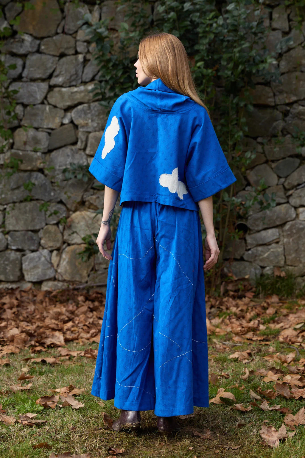 White Canvas Cloud Butter Set in blue handwoven dobby cotton with applique work and Kantha stitching, back view on model