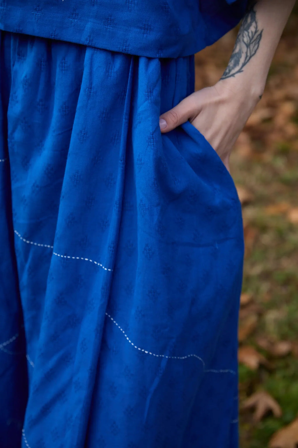White Canvas Cloud Butter Set in blue handwoven dobby cotton with applique work and Kantha stitching, full-length styled view