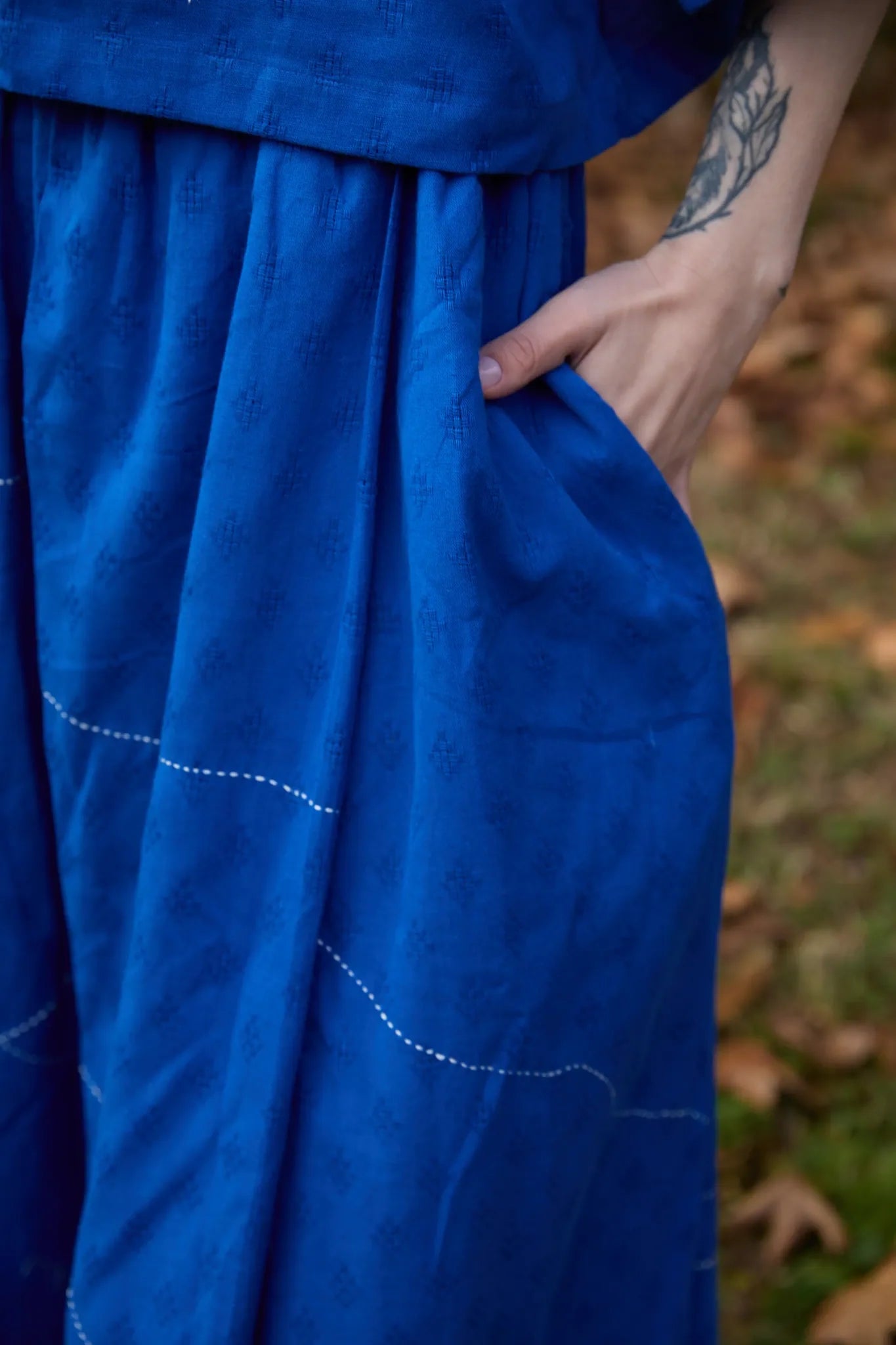 White Canvas Cloud Butter Set in blue handwoven dobby cotton with applique work and Kantha stitching, full-length styled view