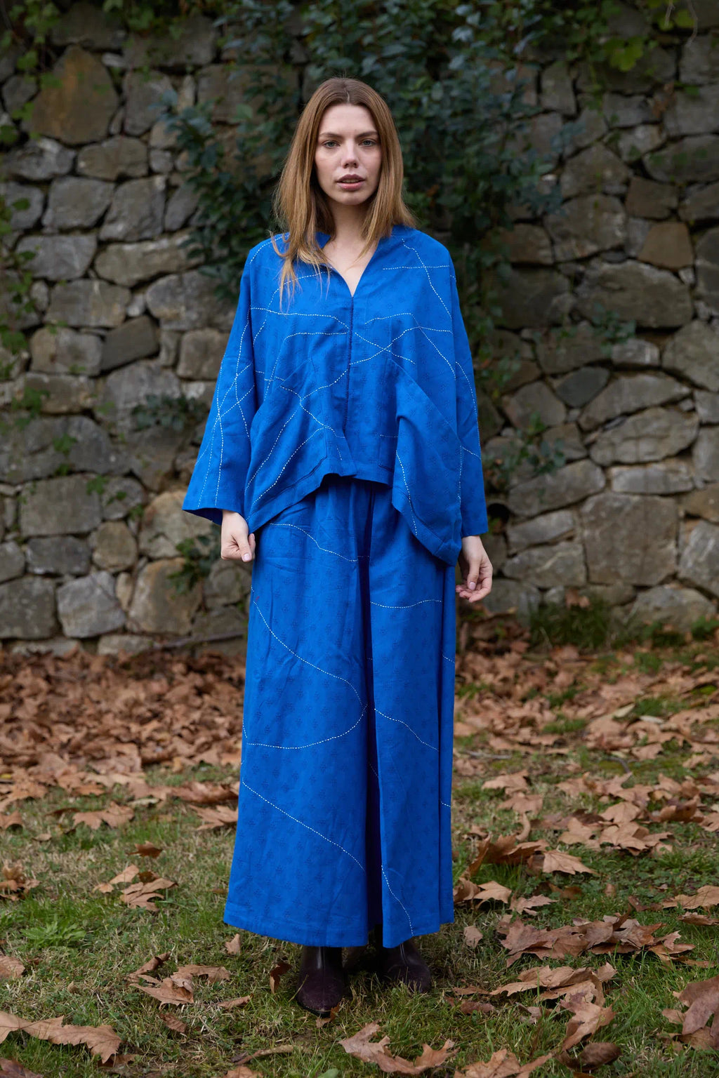 White Canvas Cloud Dahlia Set in blue handwoven dobby cotton with Kantha stitching, front view on model
