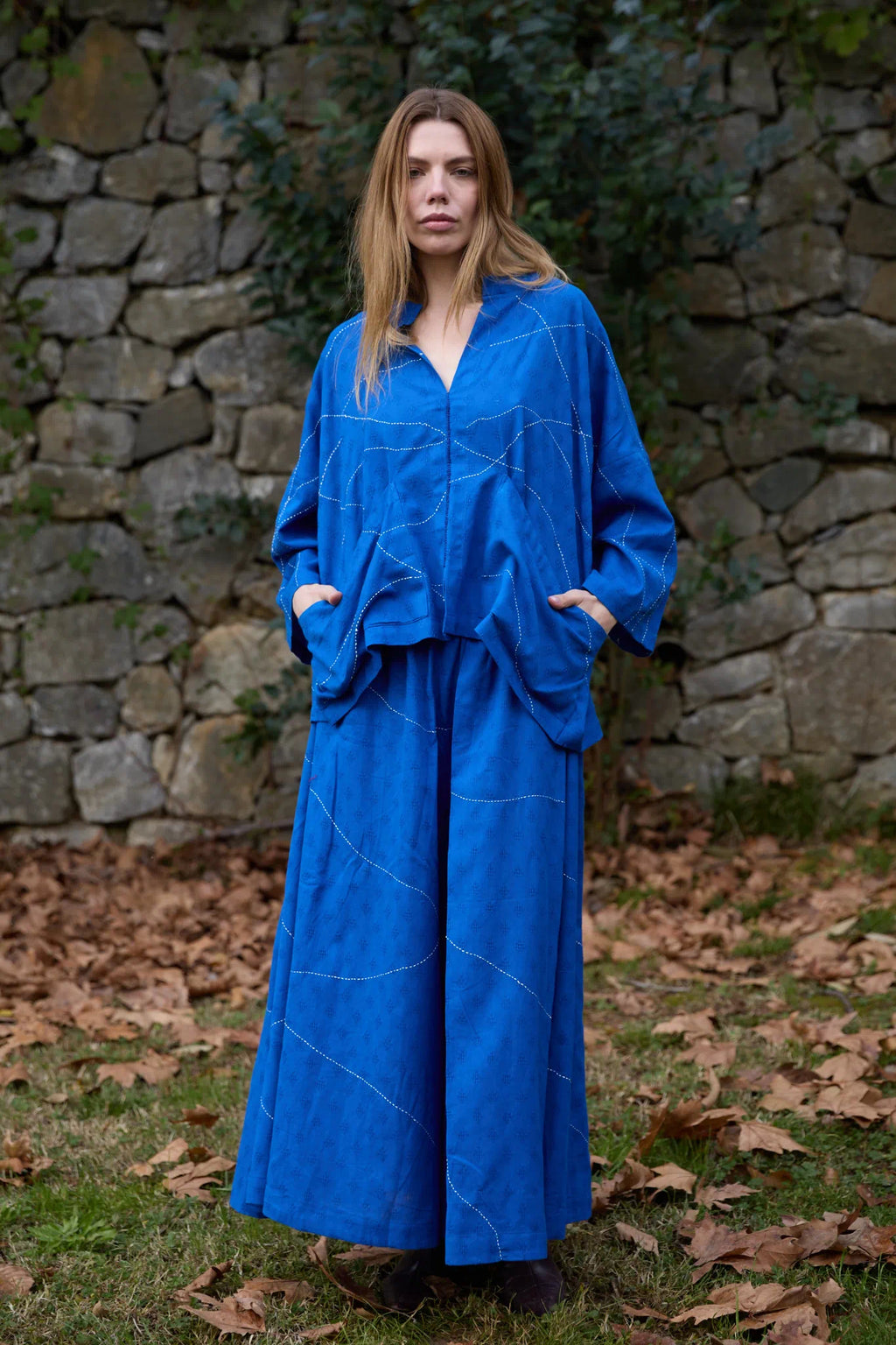 White Canvas Cloud Dahlia Set in blue handwoven dobby cotton with Kantha stitching, detail view on model