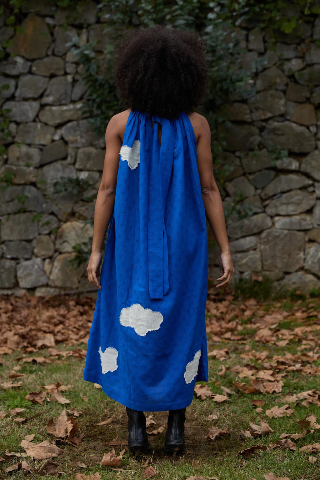 White Canvas Cloud Flintstone Dress in blue handwoven dobby cotton with applique work, side view on model