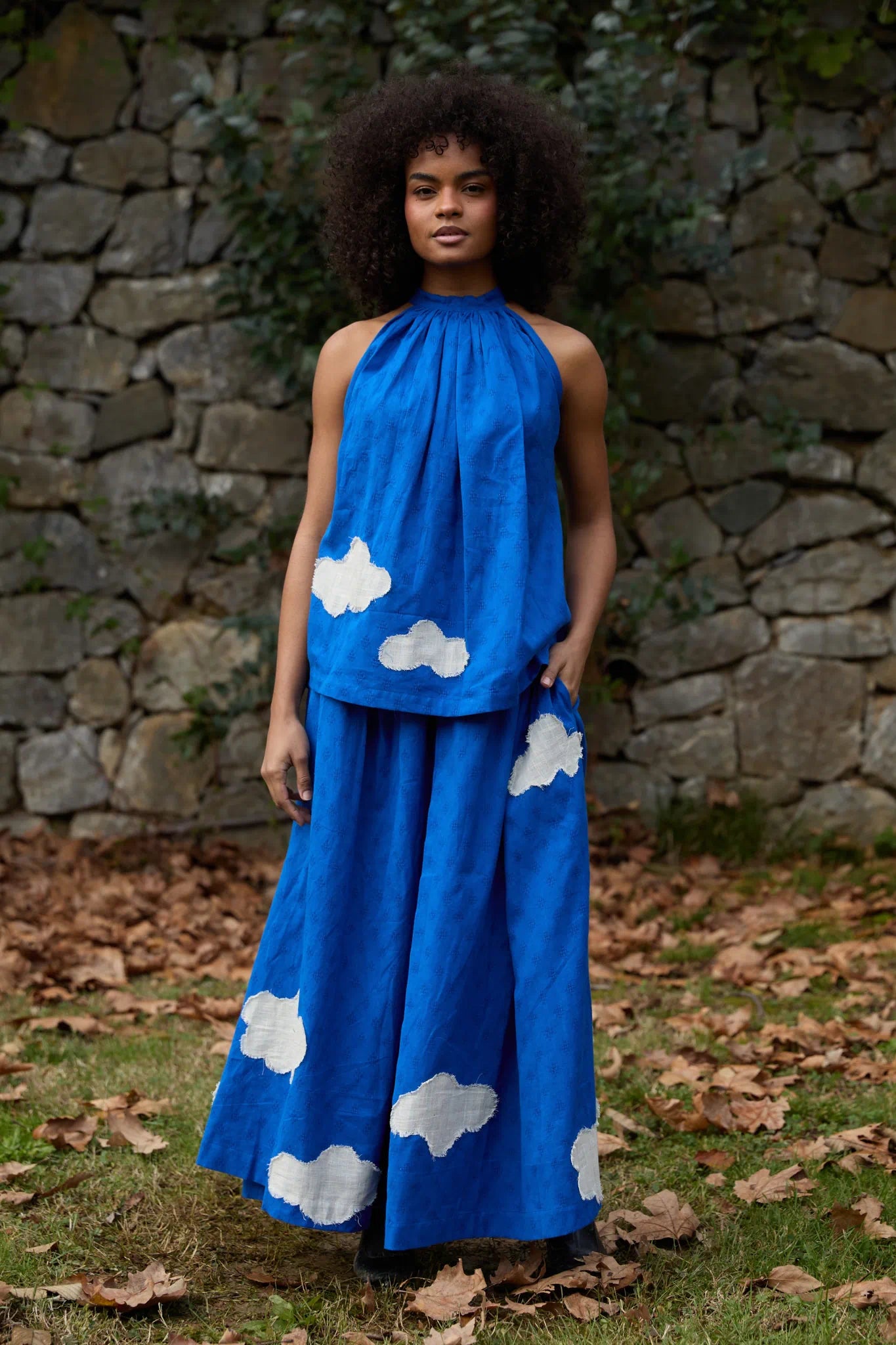 White Canvas Cloud Flintstone Set in blue handwoven dobby cotton with applique work, front view on model