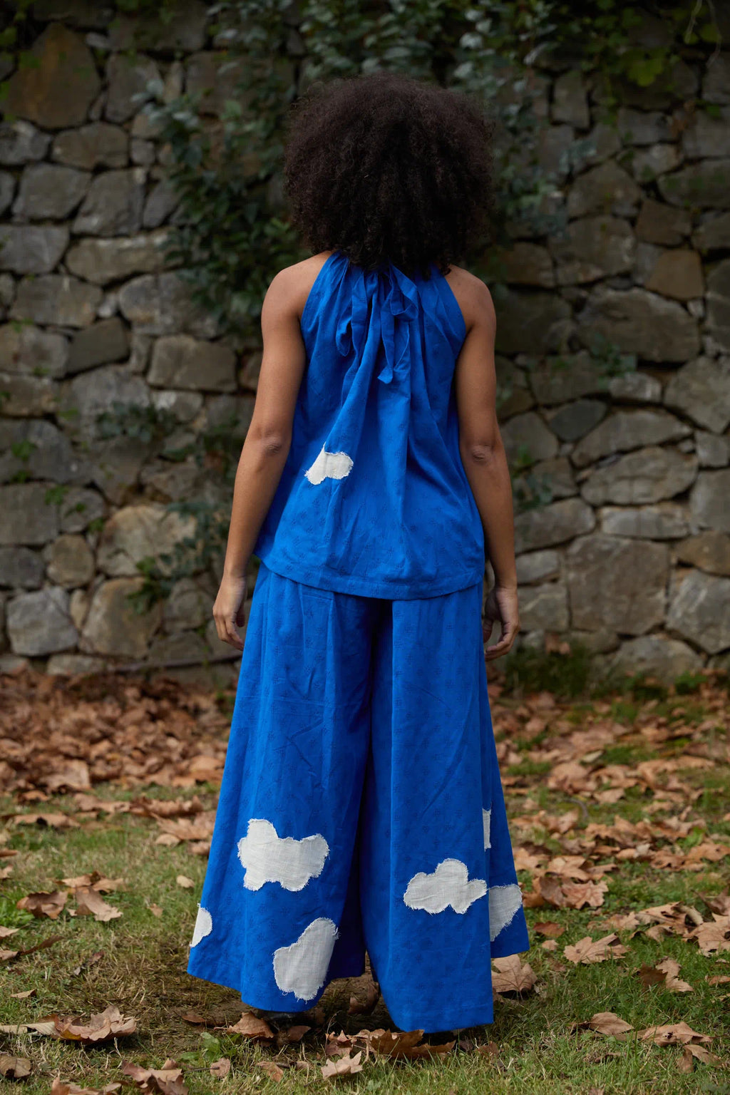White Canvas Cloud Flintstone Set in blue handwoven dobby cotton with applique work, back view on model