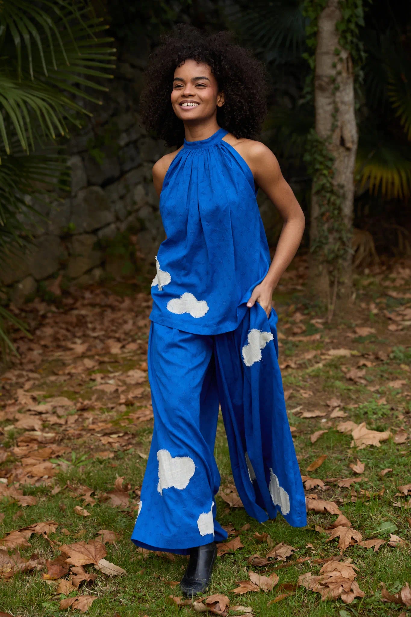 White Canvas Cloud Flintstone Top in blue handwoven dobby cotton with applique work, full-length styled view