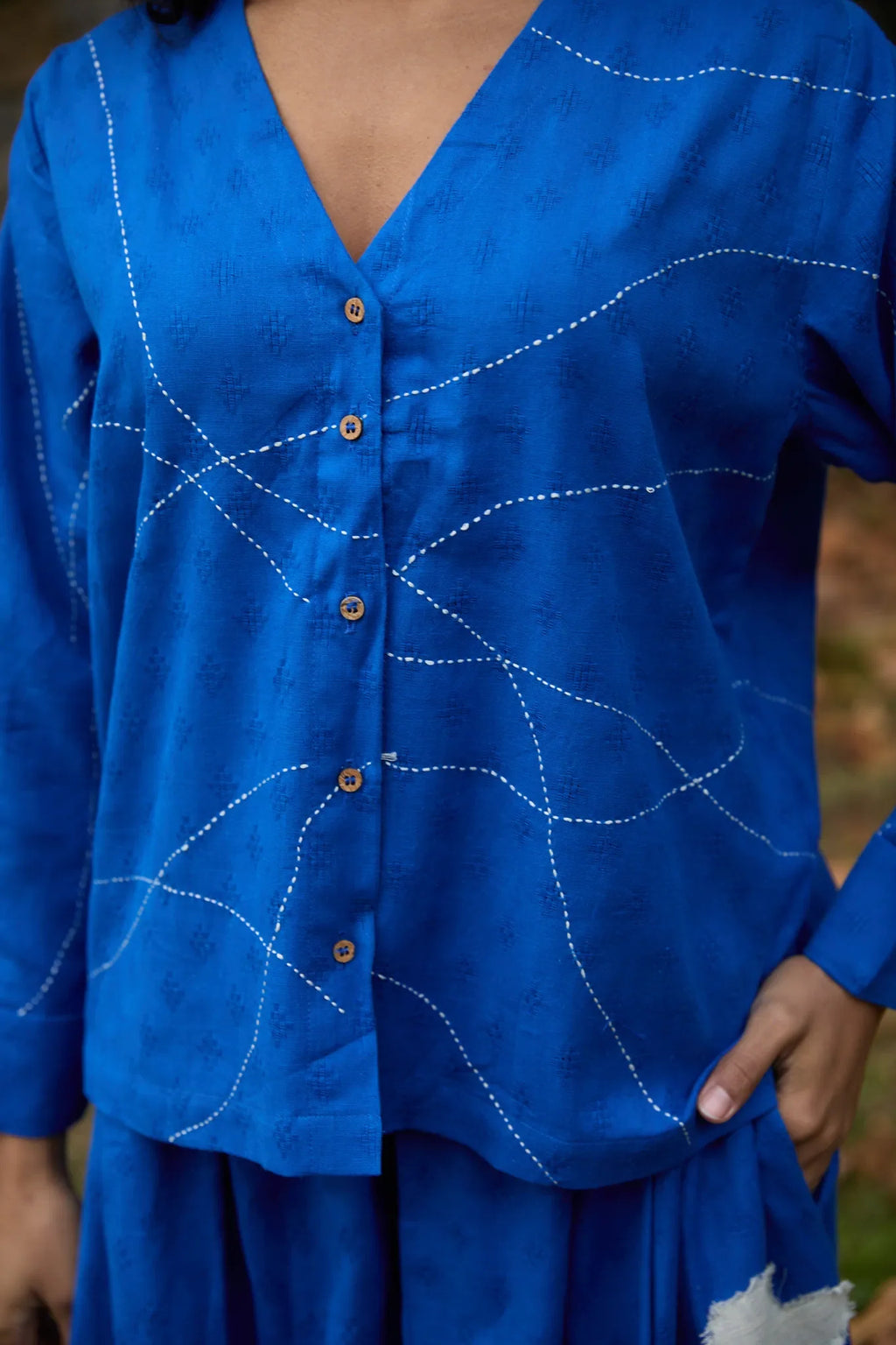 White Canvas Cloud Glimpse Set in blue handwoven dobby cotton with applique work and Kantha stitching, detail view on model