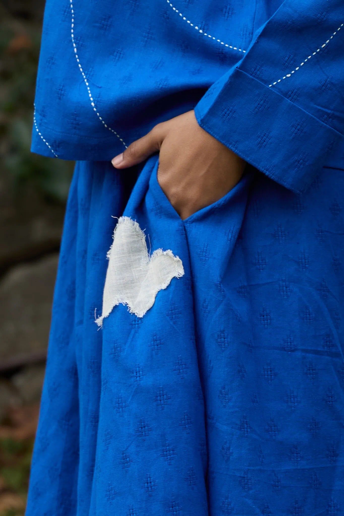 White Canvas Cloud Glimpse Set in blue handwoven dobby cotton with applique work and Kantha stitching, full-length styled view