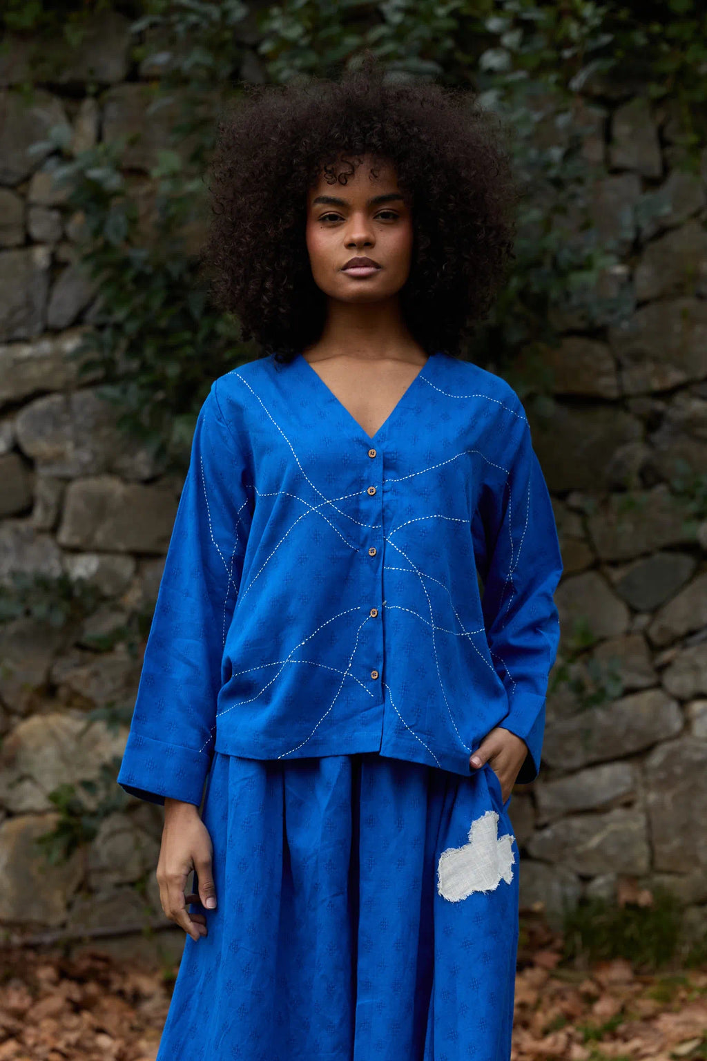 White Canvas Cloud Glimpse Top in blue handwoven dobby cotton with Kantha stitching, front view on model