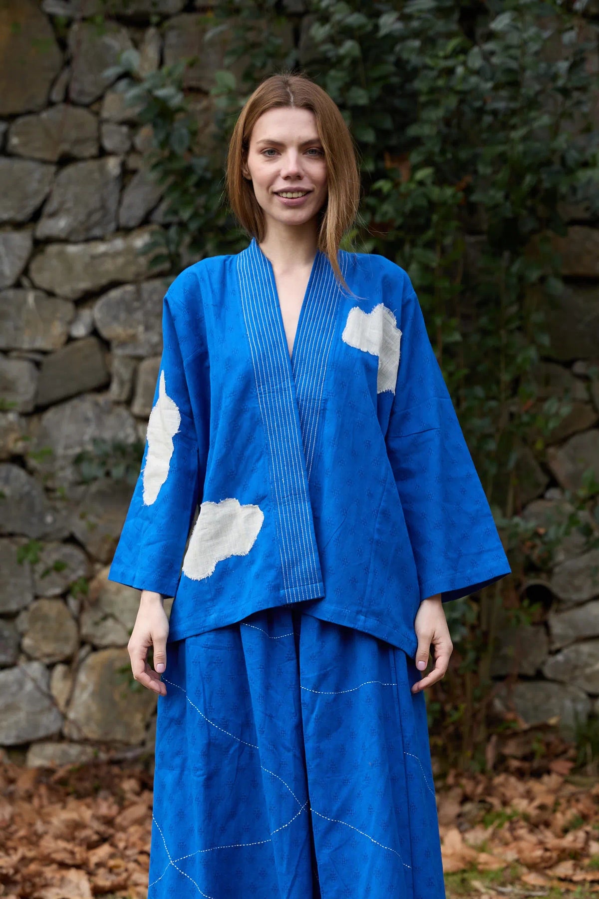 White Canvas Cloud Indore Jacket in blue handwoven dobby cotton with applique work, front view on model
