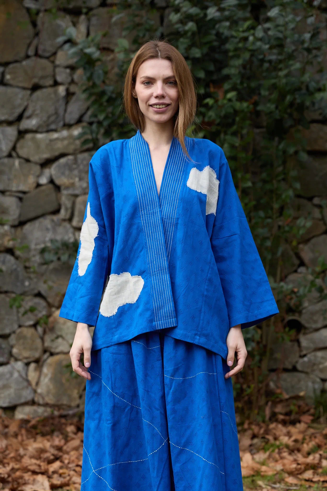 White Canvas Cloud Indore Jacket in blue handwoven dobby cotton with applique work, front view on model