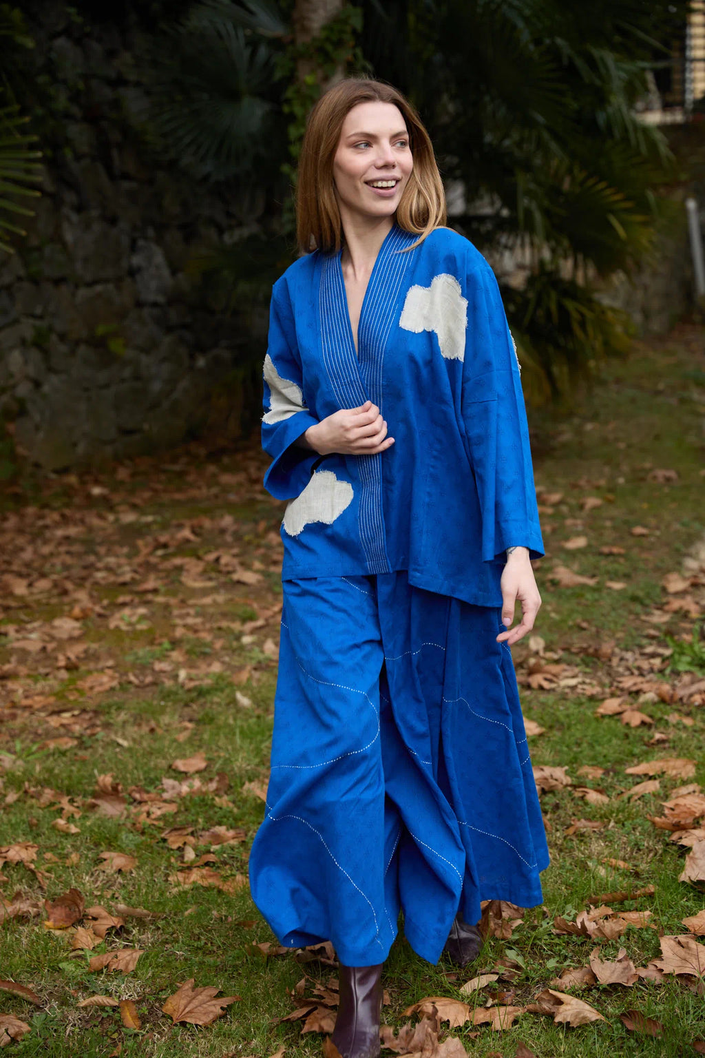 White Canvas Cloud Indore Jacket in blue handwoven dobby cotton with applique work, detail view on model