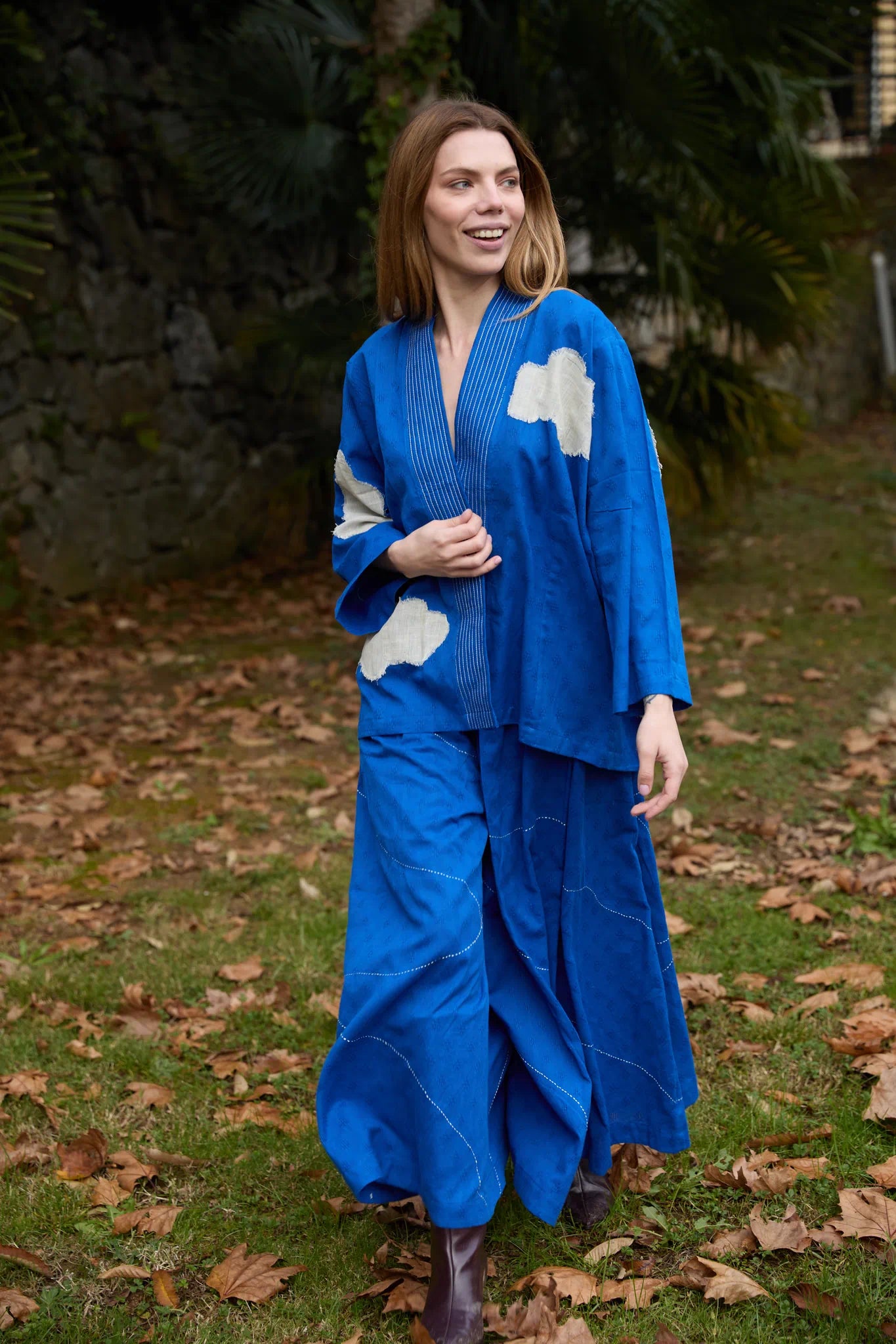 White Canvas Cloud Indore Jacket in blue handwoven dobby cotton with applique work, detail view on model
