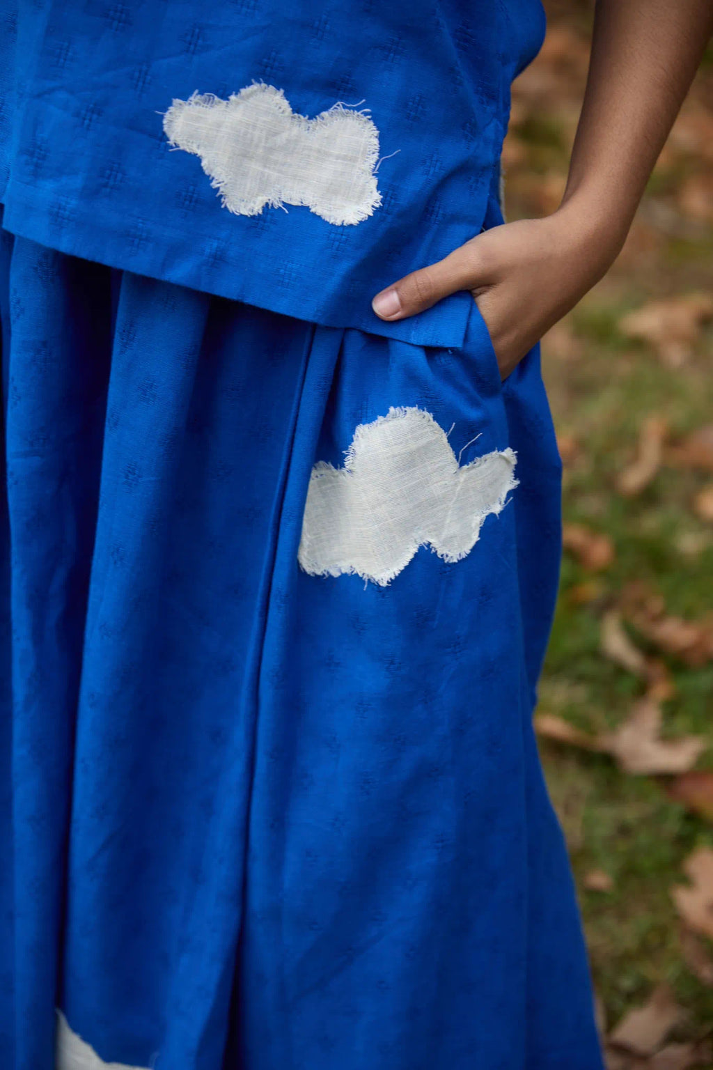 White Canvas Cloud Jerry Set in blue handwoven dobby cotton with applique work, full-length styled view