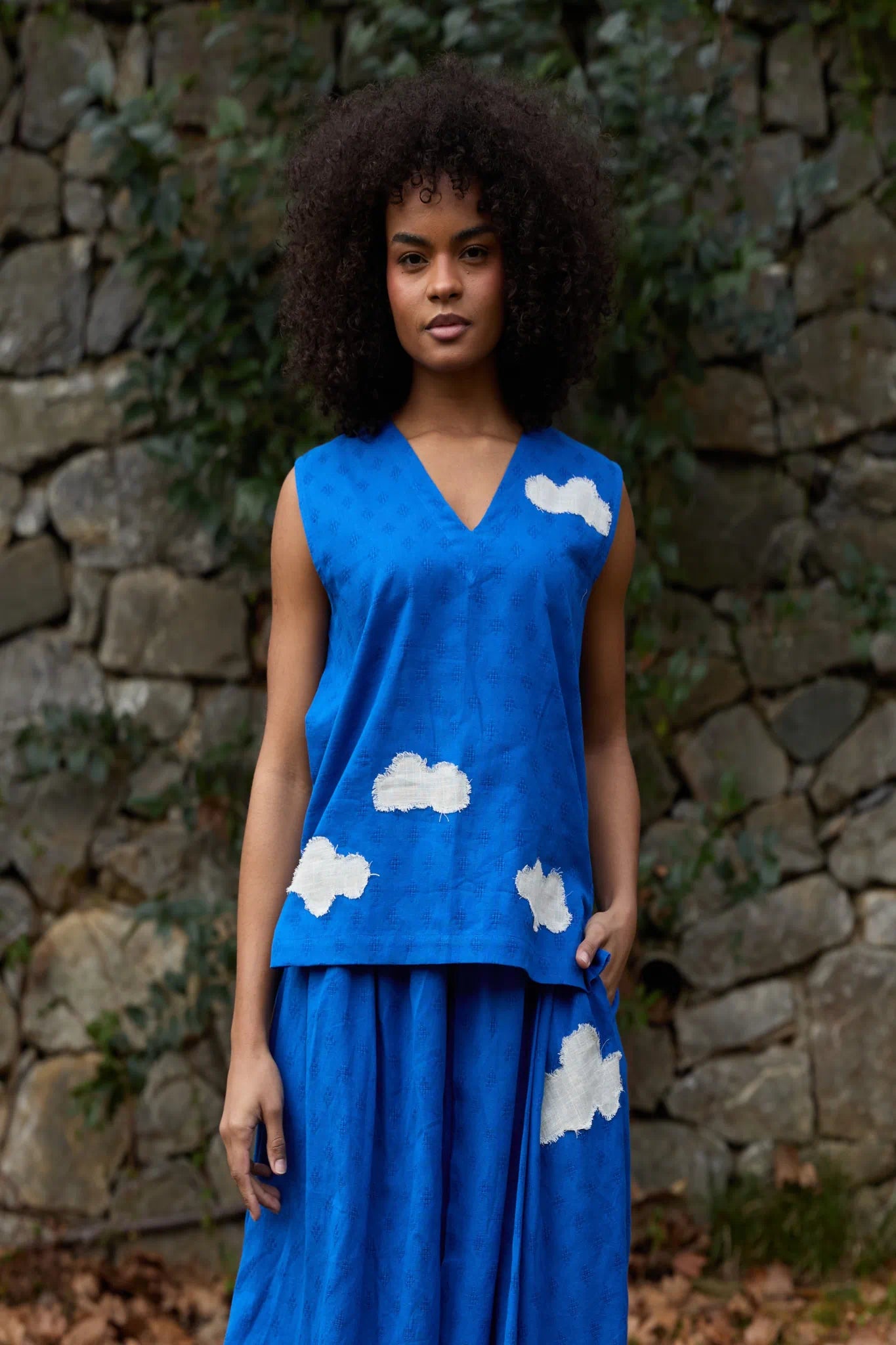 White Canvas Cloud Jerry Top in blue handwoven dobby cotton with applique work, front view on model