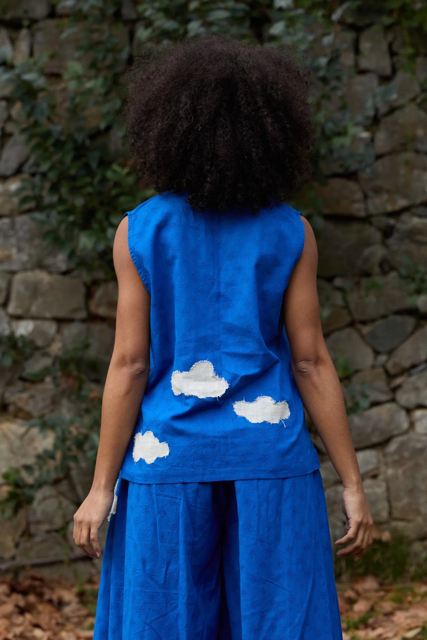 White Canvas Cloud Jerry Top in blue handwoven dobby cotton with applique work, back view on model