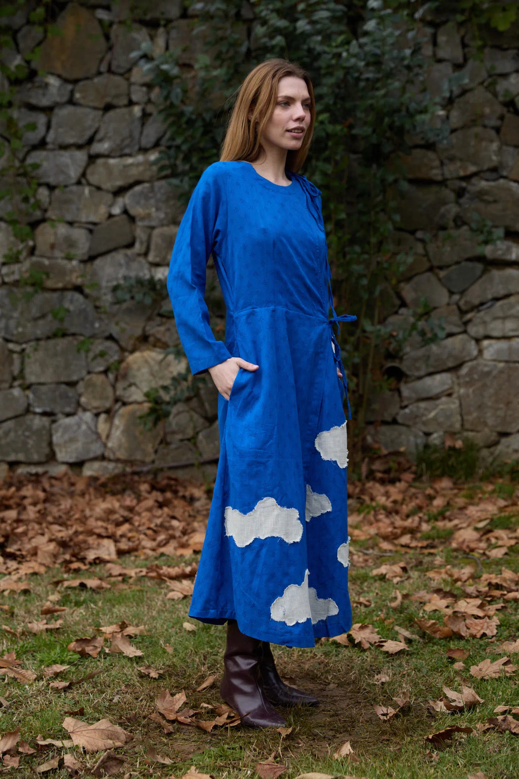 White Canvas Cloud Metis Dress in blue handwoven dobby cotton with applique work, back view on model