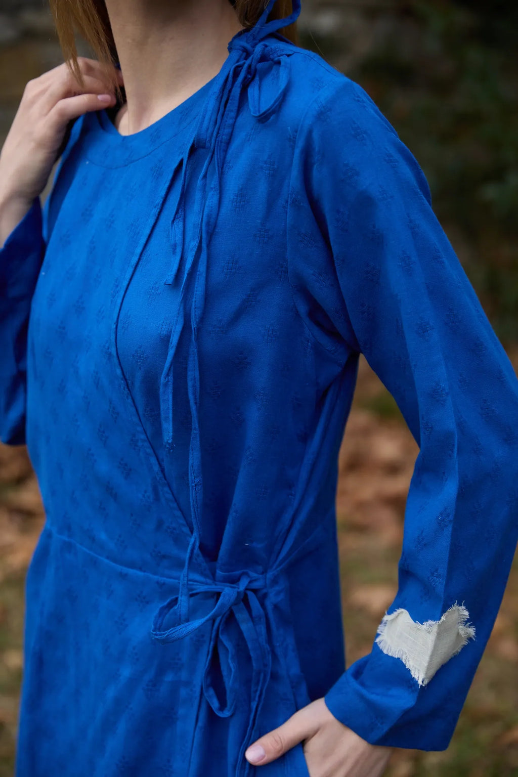 White Canvas Cloud Metis Dress in blue handwoven dobby cotton with applique work, full-length styled view