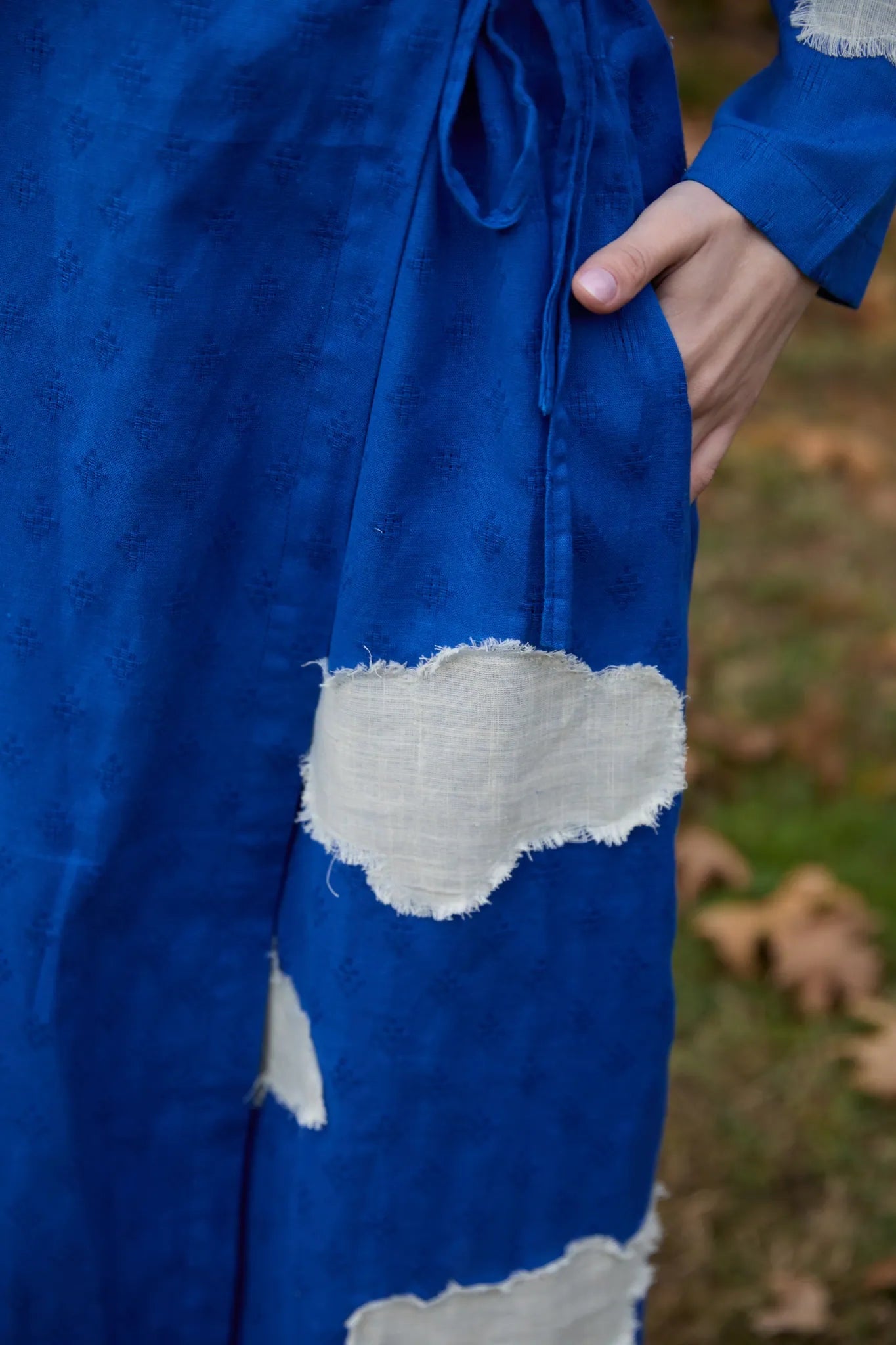 White Canvas Cloud Metis Dress in blue handwoven dobby cotton with applique work, alternate styled view