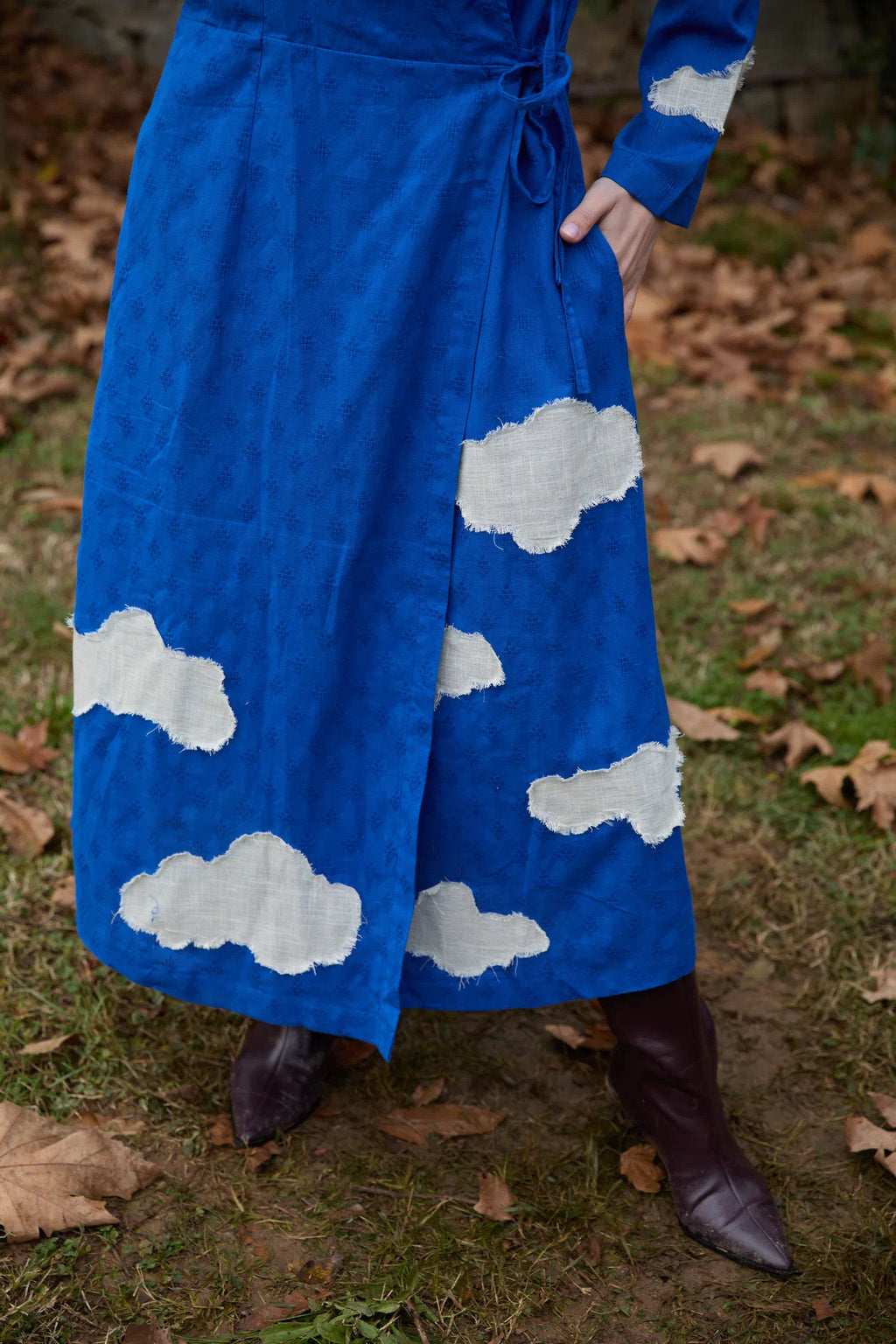 White Canvas Cloud Metis Dress in blue handwoven dobby cotton with applique work, close-up product view