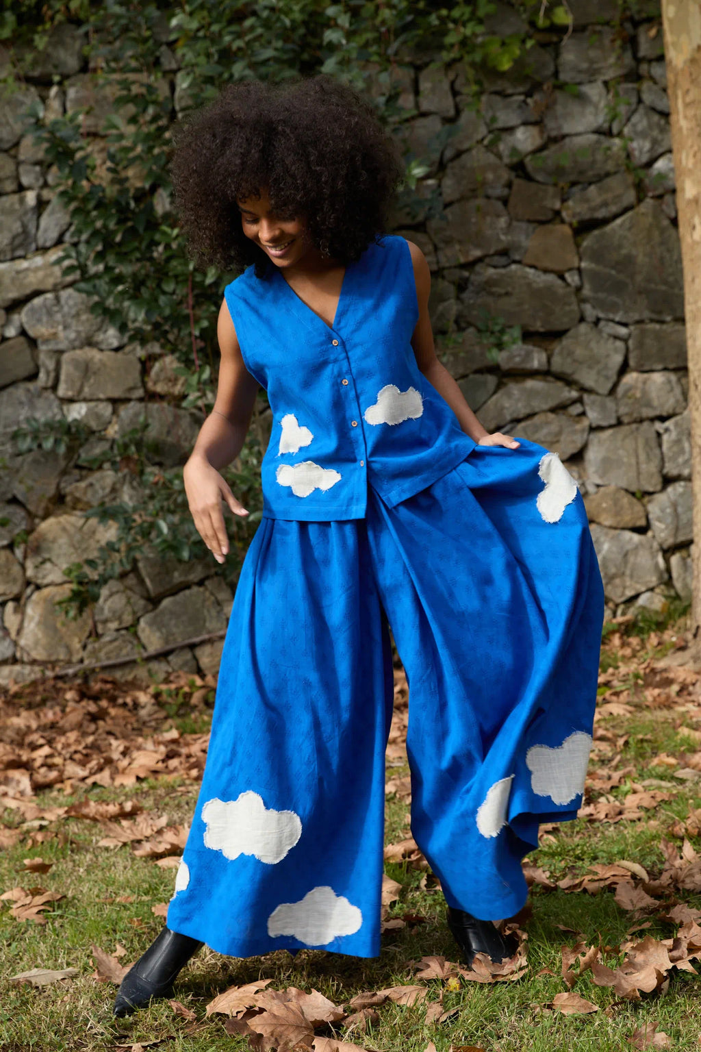 White Canvas Cloud Marti Pants in blue handwoven dobby cotton with applique work, full-length styled view