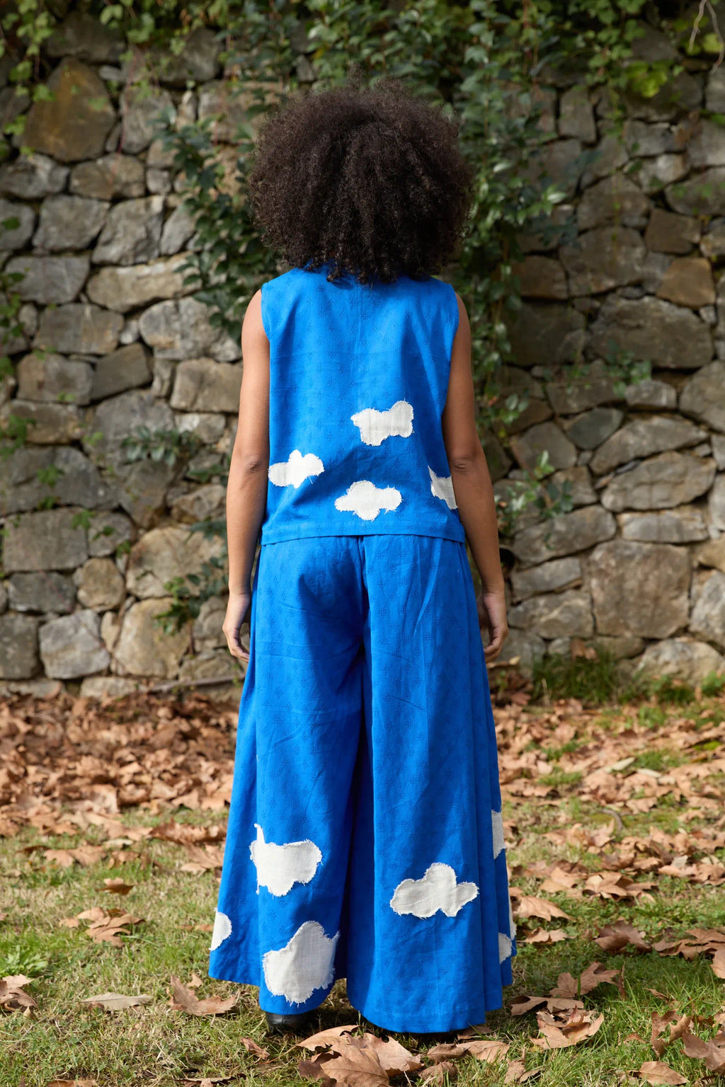 White Canvas Cloud Marti Set in blue handwoven dobby cotton with applique work, side view on model