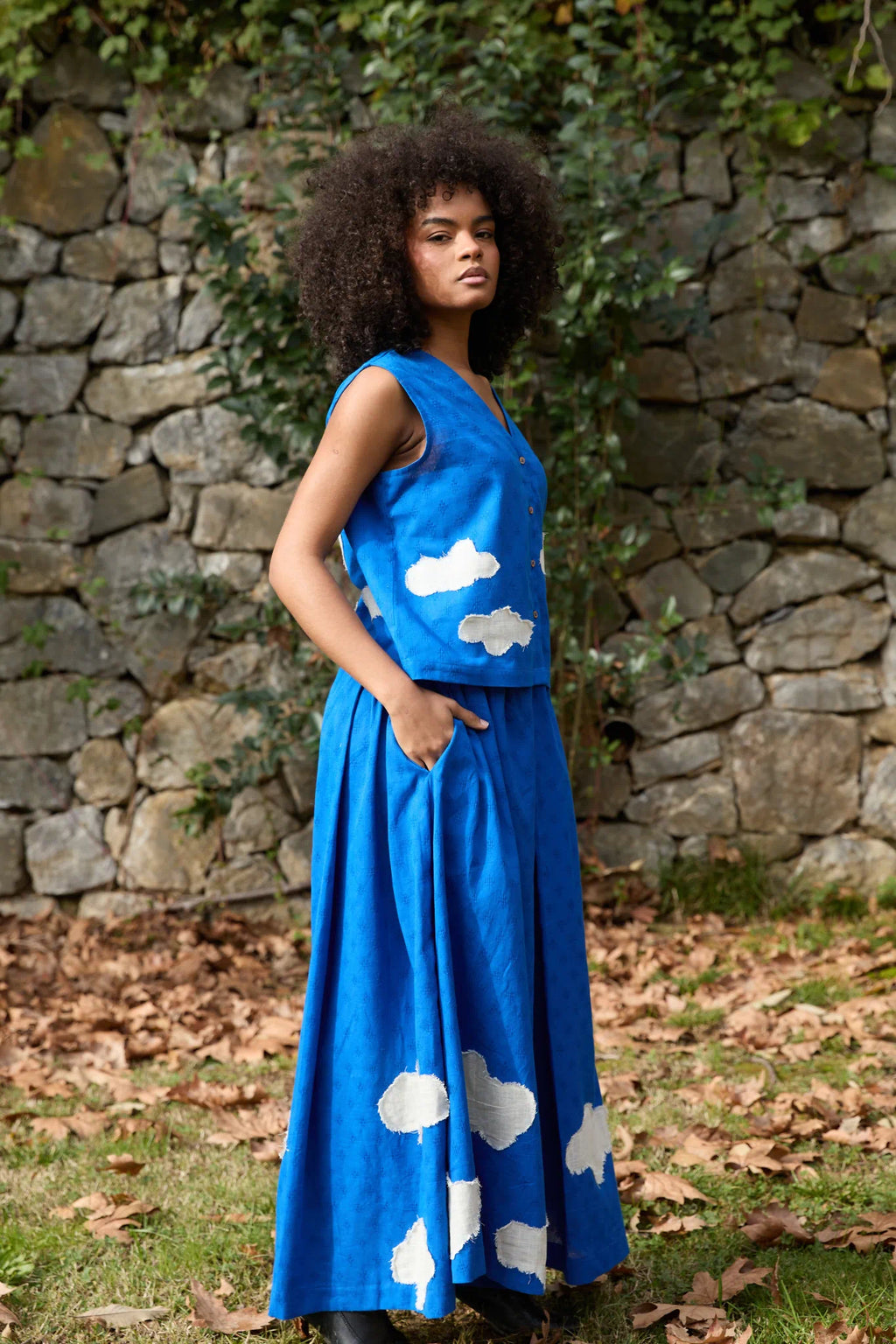 White Canvas Cloud Marti Set in blue handwoven dobby cotton with applique work, back view on model