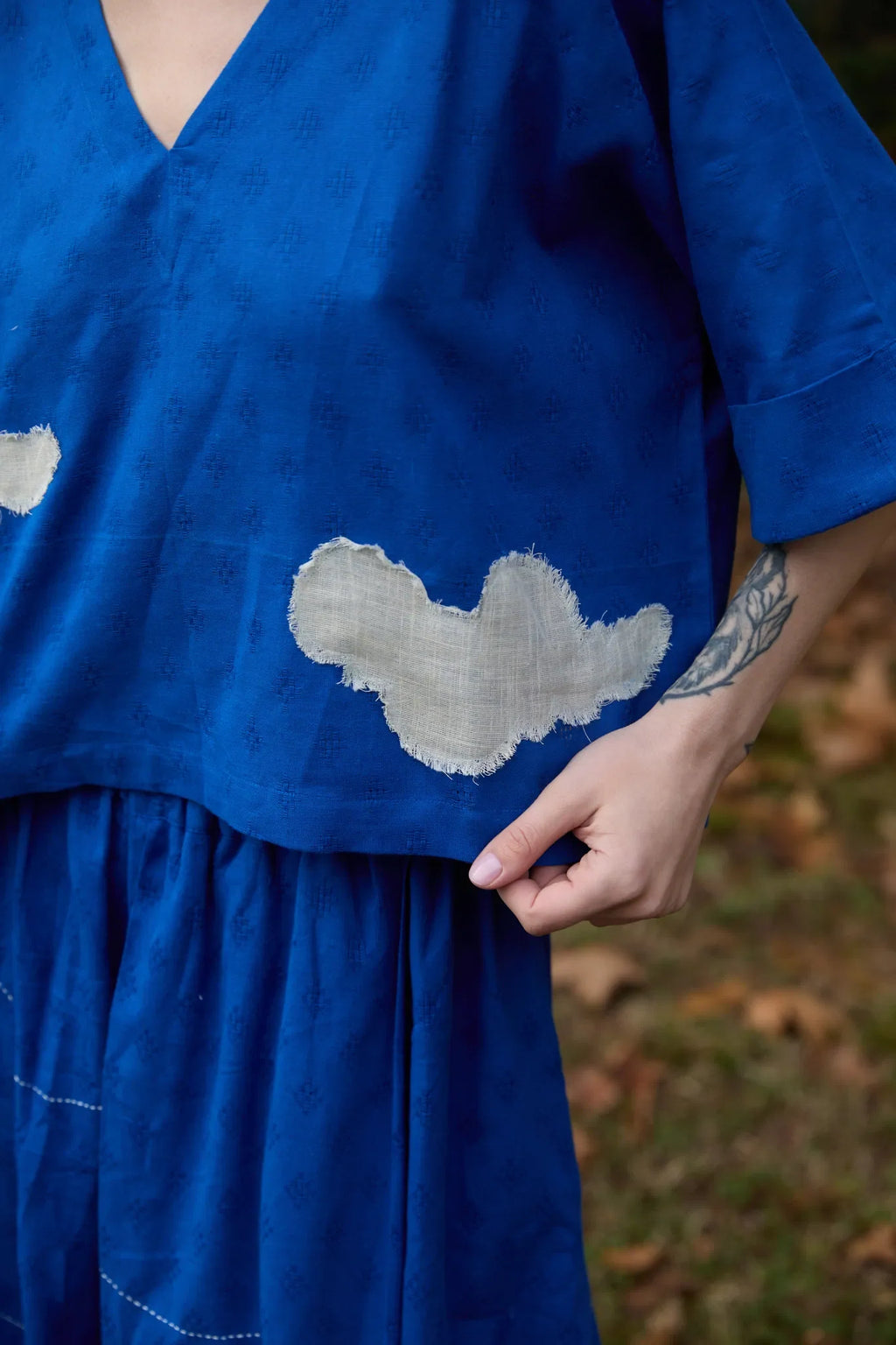 White Canvas Cloud Nikki Set in blue handwoven dobby cotton with applique work and Kantha stitching, full-length styled view