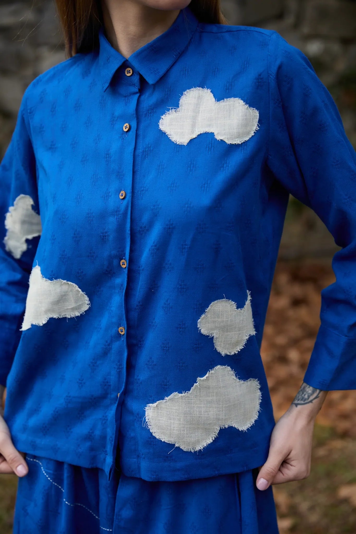 White Canvas Cloud Only Set in blue handwoven dobby cotton with applique work, full-length styled view