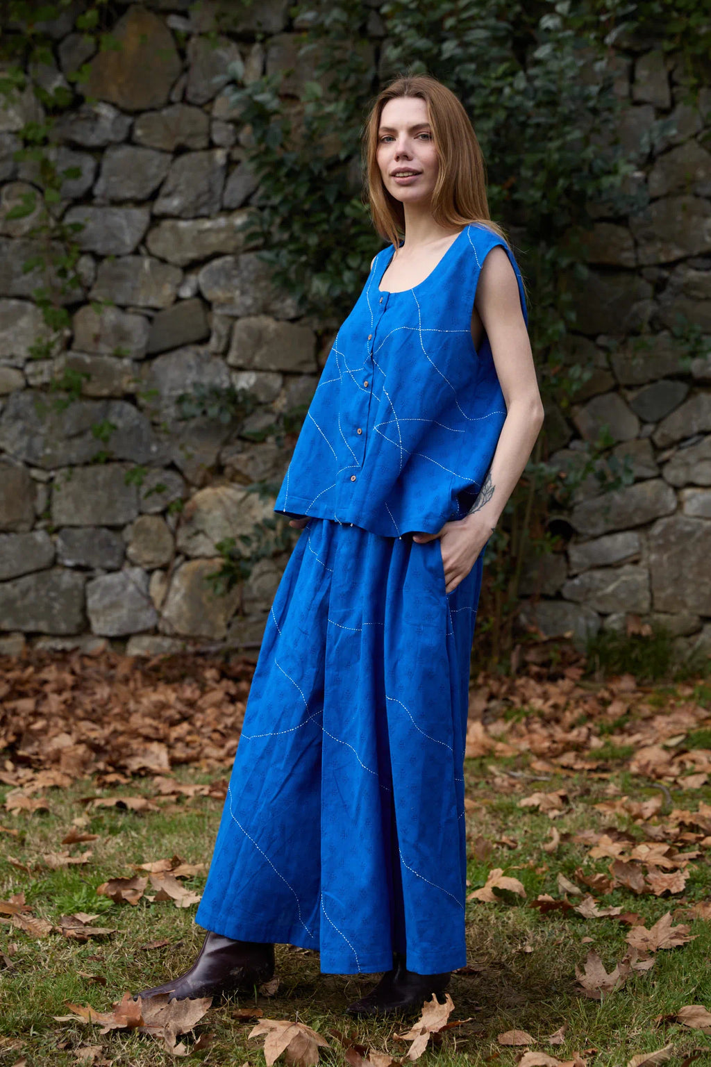 White Canvas Cloud Surreal Set in blue handwoven dobby cotton with Kantha stitching, angled view on model