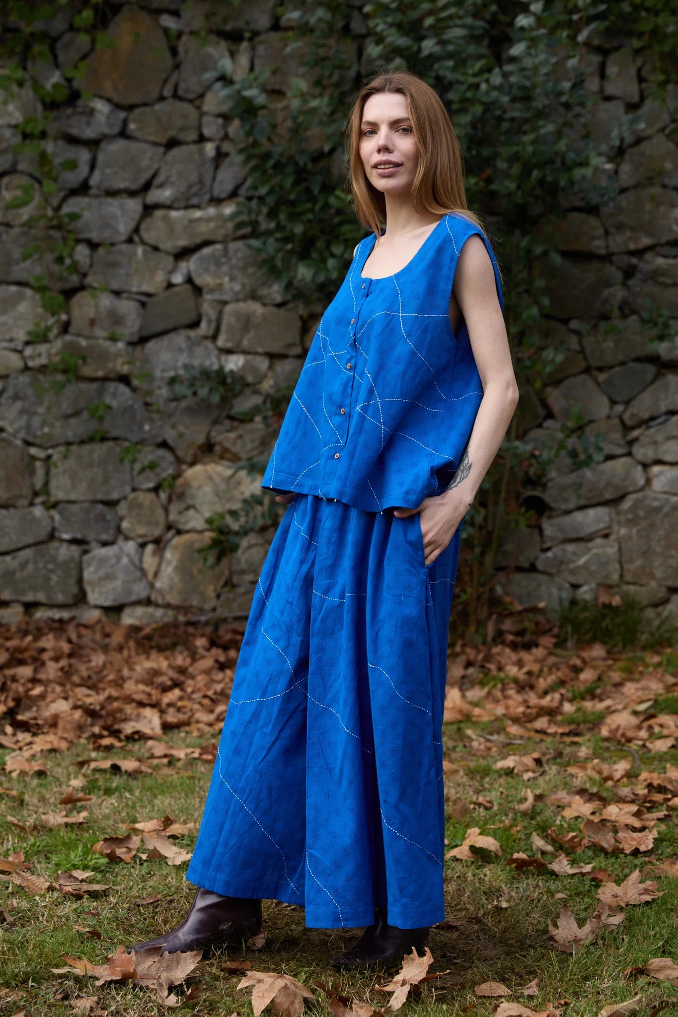 White Canvas Cloud Surreal Set in blue handwoven dobby cotton with Kantha stitching, angled view on model
