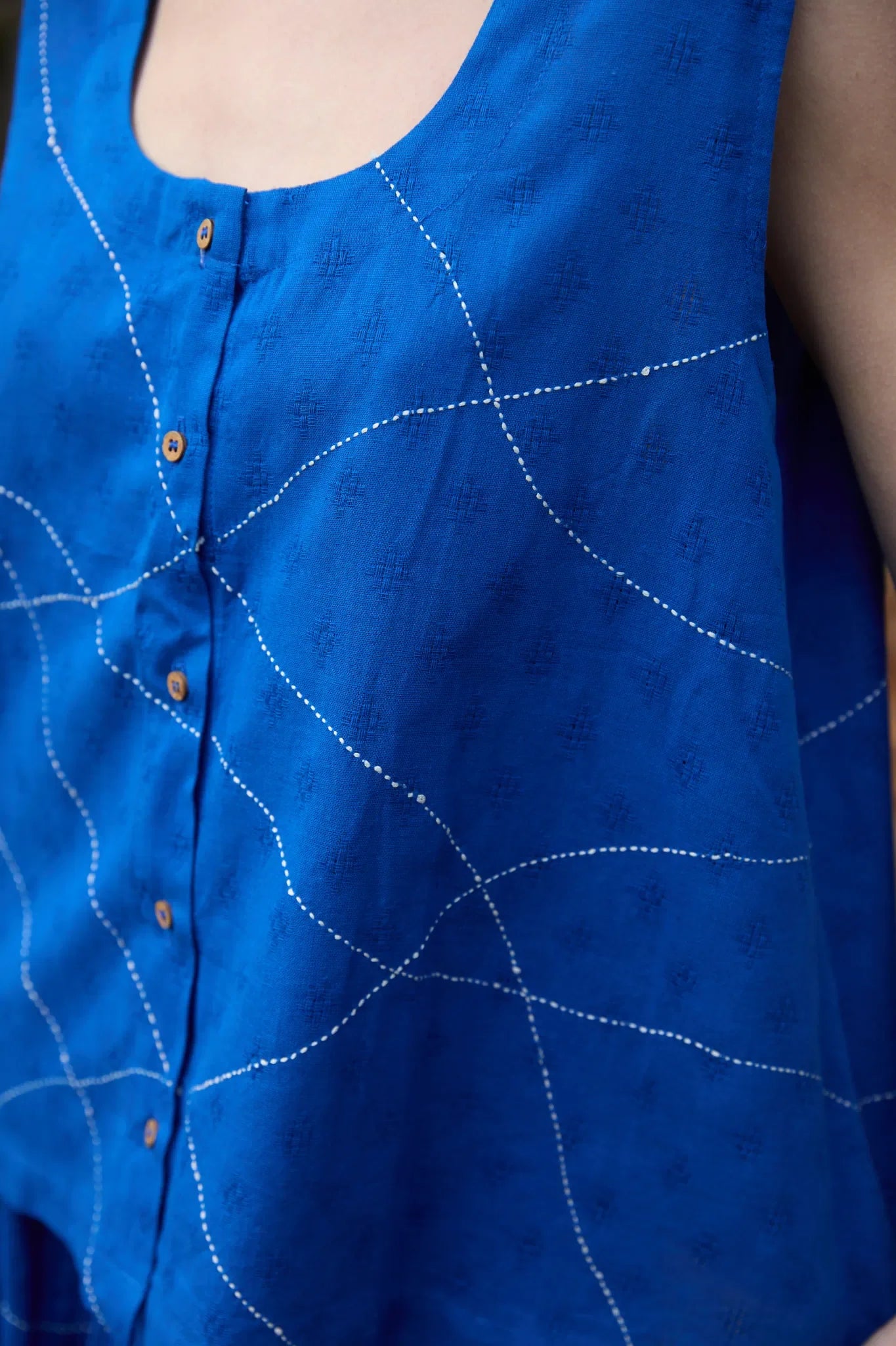 White Canvas Cloud Surreal Set in blue handwoven dobby cotton with Kantha stitching, detail view on model