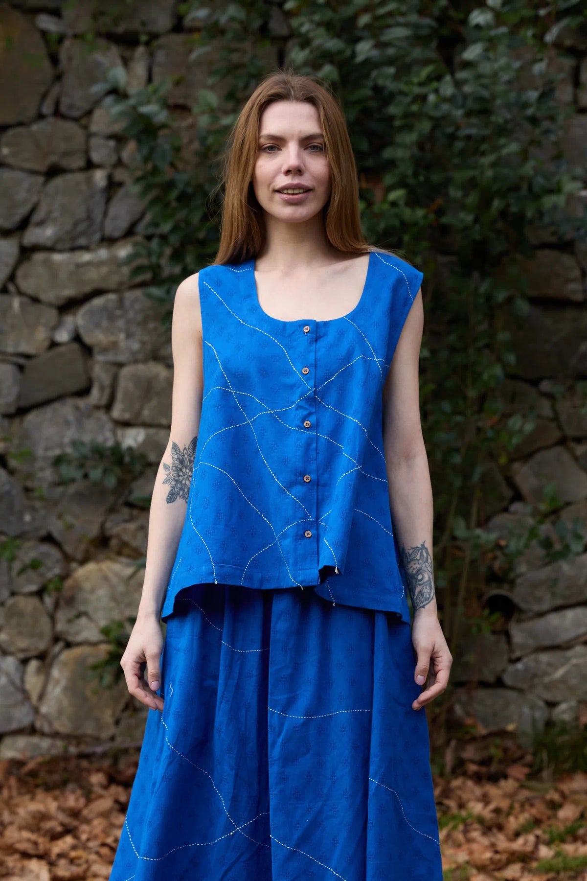 White Canvas Cloud Surreal Top in blue handwoven dobby cotton with Kantha stitching, front view on model