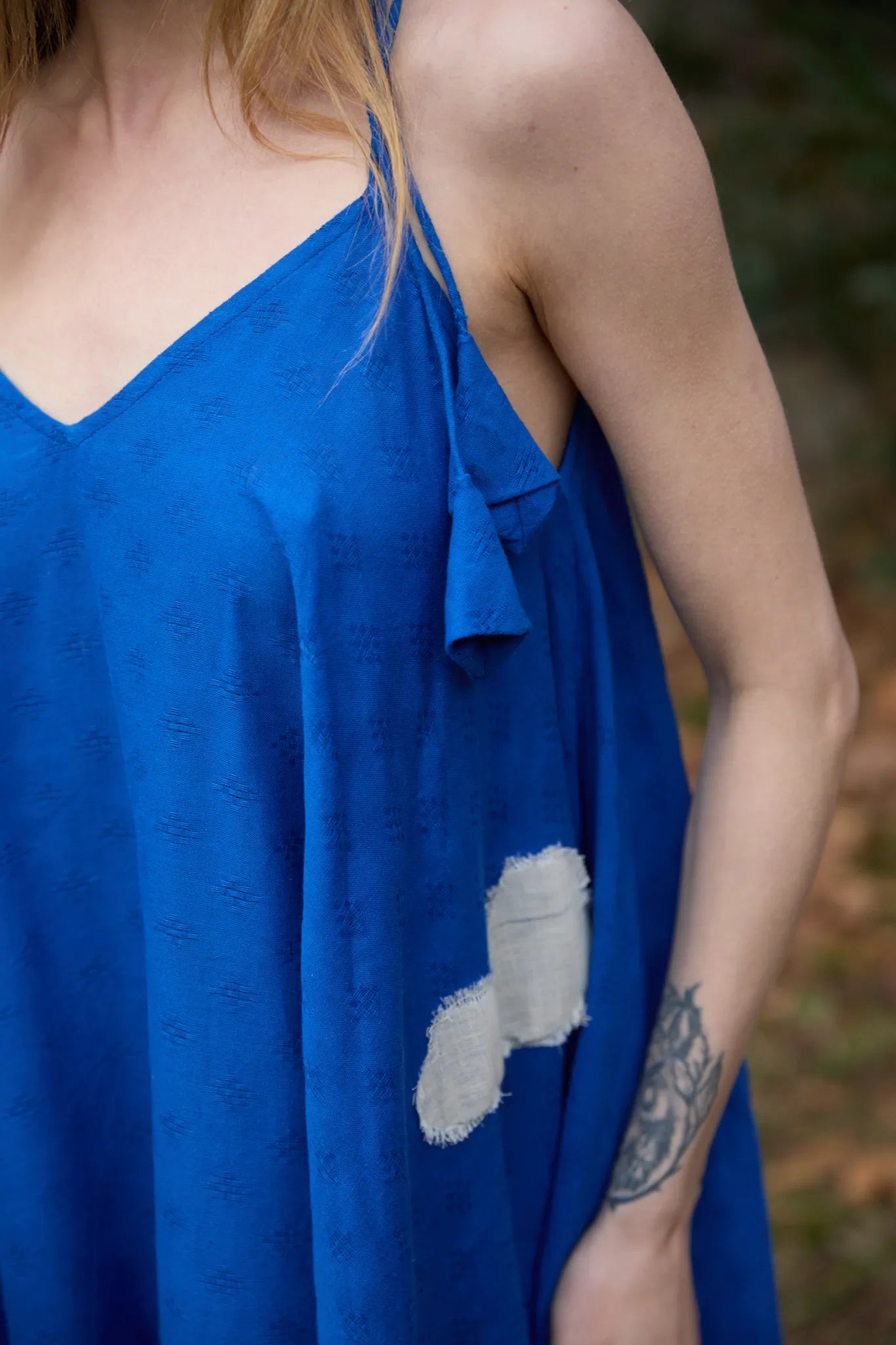 White Canvas Cloud Whirl Dress in blue handwoven dobby cotton with applique work, back view on model