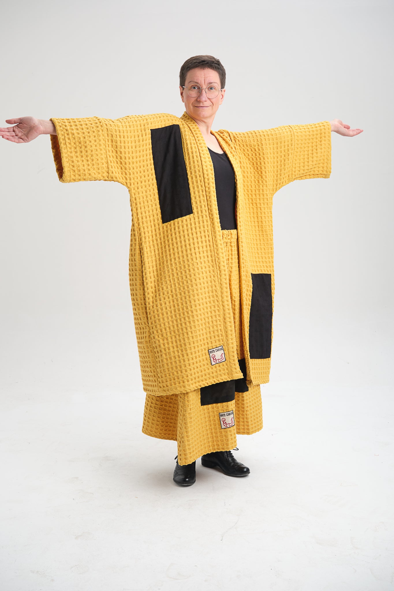 Chic and sustainable Ripple Jacket – ethical handmade fashion for everyday wear. Breathable cotton, artisanal embroidery, and timeless design.