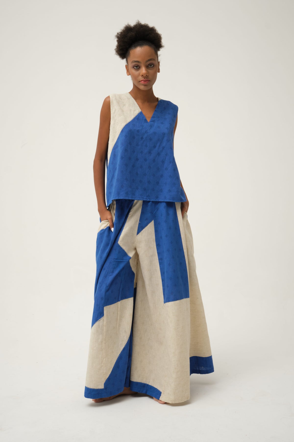 White Canvas Blue Bunny Set in blue handwoven dobby cotton with handwoven texture, front view on model
