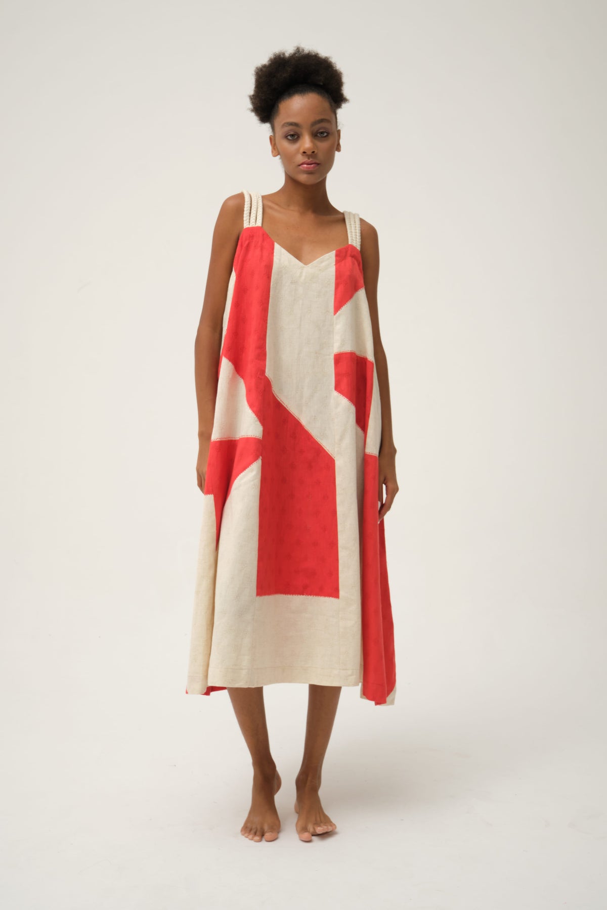 White Canvas Red Charlie Dress in red handwoven dobby cotton with Kantha stitching, front view on model