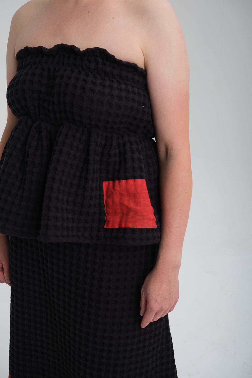 Elegant black set for women, handcrafted from breathable cotton fabric. A timeless, sustainable fashion piece perfect for casual and formal wear."


"Soft and breathable grey cotton dress fabric with a unique waffle texture, offering comfort and effortless style."

"Minimalist grey dress with a flattering silhouette, designed for comfort and versatility. Ethically made slow fashion piece."

 
"Hand-stitch