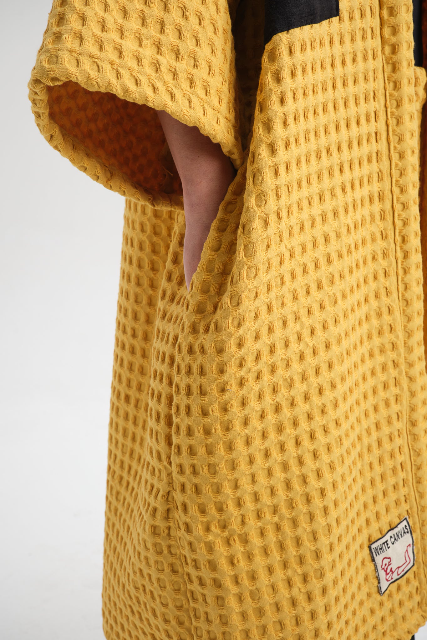 Chic and sustainable Ripple Jacket – ethical handmade fashion for everyday wear. Breathable cotton, artisanal embroidery, and timeless design.