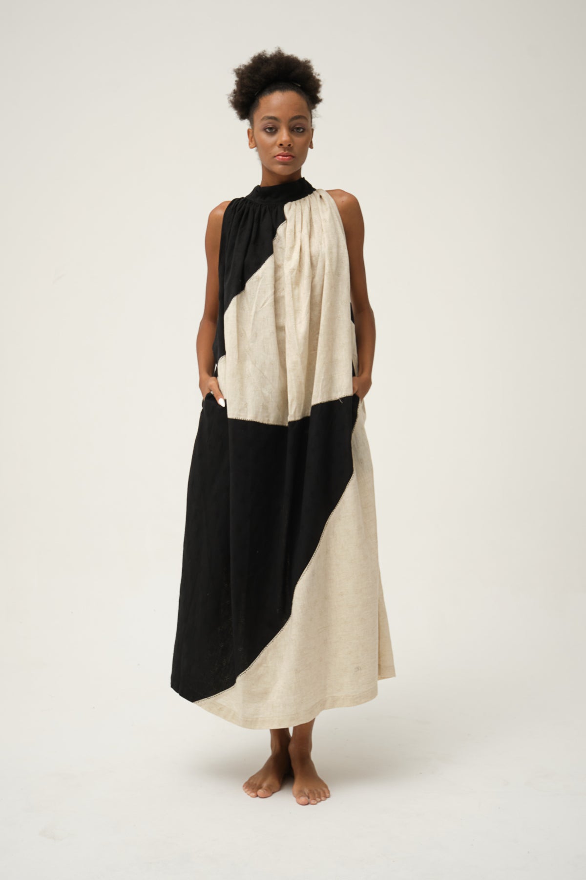 Contemporary handwoven fabrics with traditional Kantha embroidery